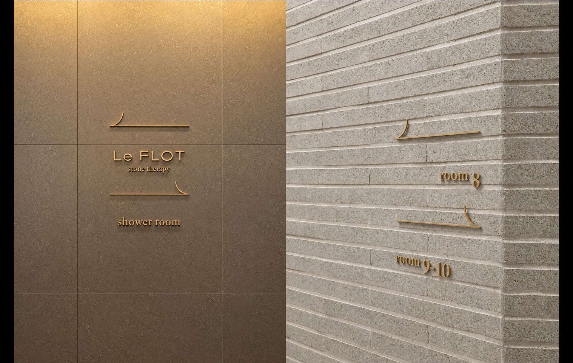 Signage on stone wall
